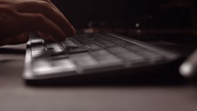 Close up slow motion white caucasian male typing on computer keyboard - Powered by Shutterstock - Get 15% off with code: PIKWIZARD15