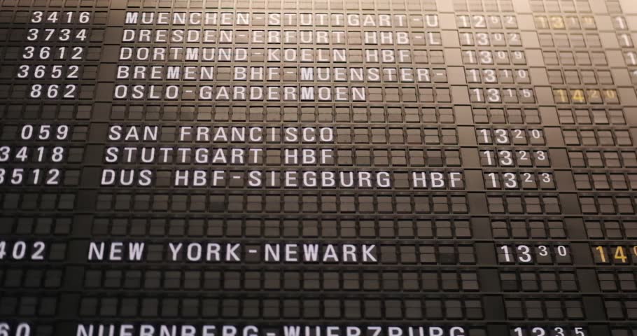 Main hall Modern European airport main hall, black mechanical flight information display board slow motion, flight arrivals and departures board European Airport, Germany, Frankfurt