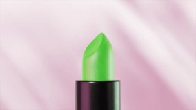 Green lipstick rotates slightly, showcased against pink and white backgrounds, creating a visually appealing contrast and highlighting the vibrant color of the cosmetic product. 3D Illustration - Powered by Shutterstock - Get 15% off with code: PIKWIZARD15