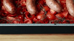  delicious dinner featuring sausages, red bell peppers, onions, and tomatoes cooked together - Powered by Shutterstock - Get 15% off with code: PIKWIZARD15