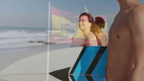 Walking on beach, young people with Spanish flag waving in background. celebration, vacation, travel, friends, sunset, summer - Powered by Shutterstock - Get 15% off with code: PIKWIZARD15