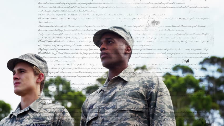 Standing with Constitution text overlay, U.S. Air Force personnel in focus. Military, patriotism, armed forces, defense, service, uniform