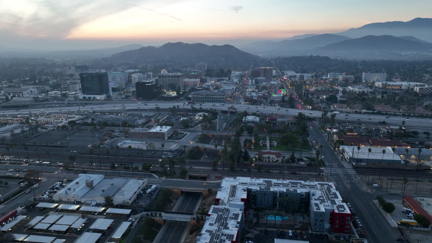 Twilight view of the downtown skyline, interstate 91 Freeway, and urban core of Riverside, California, USA.