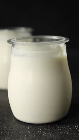 Skyr white yogurt appetizer dish fresh delicious gourmet food background on table rustic food top view copy space keto and paleo diet vegetarian food