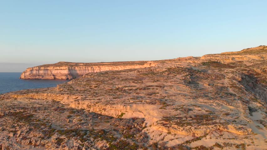 Breathtaking Drone Flyback Over Gozo’s Dwejra Bay | A Grand Aerial Perspective of Malta’s Rugged Coastline