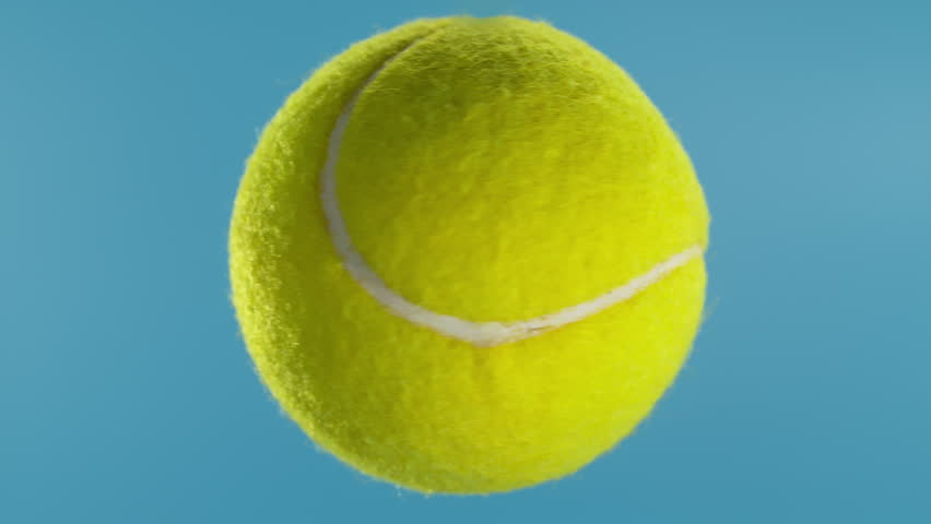 Tennis Ball Rotating in Super Slow Motion on Blue Screen, 1000 fps.