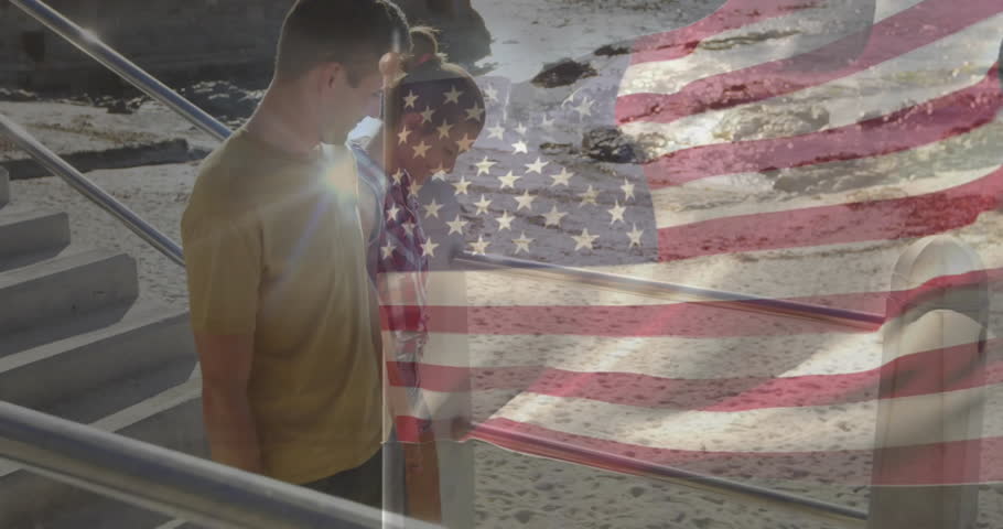 Walking on beach, people with American flag animation overlay near ocean waves. Patriotism, coastline, celebration, freedom, unity, summer
