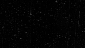 Close-up rain water drops, raindrops texture falling on black window background - Powered by Shutterstock - Get 15% off with code: PIKWIZARD15