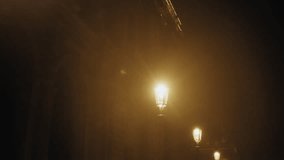Street lamps illuminating foggy night in Paris - Powered by Shutterstock - Get 15% off with code: PIKWIZARD15