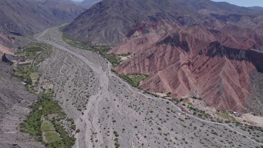 An aerial view of the Huichaira area, over the Huichaira River, near Tilcara, Jujuy, Argentina. in front of the Pucara de Tilcara fortification