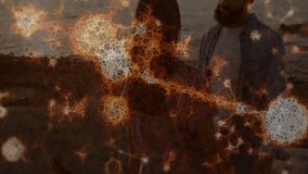 Embracing on beach, couple with glowing fractal animation overlay at sunset. Romantic, love, abstract, digital - Powered by Shutterstock - Get 15% off with code: PIKWIZARD15