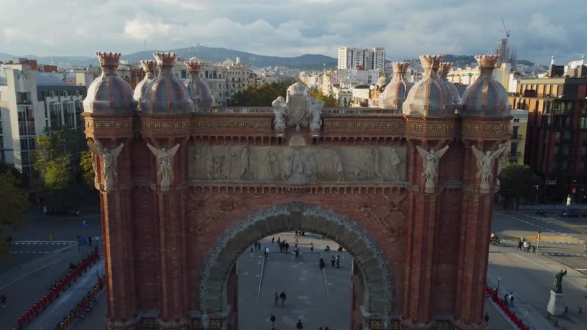 Drone video of Arc de Triomf in Barcelona at sunset.