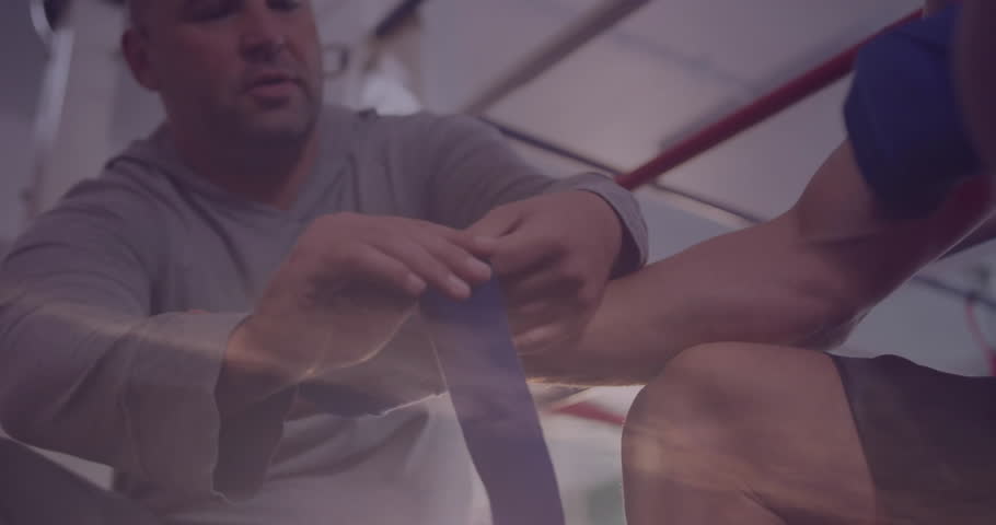 In gym, boxer with hand wrapped under sunset sky animation overlay. Boxing, fitness, training, motivation, athletic, strength