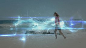Woman walking on beach with glowing abstract light animation surrounding her. sunset, silhouette, magic, surreal, fantasy, peaceful - Powered by Shutterstock - Get 15% off with code: PIKWIZARD15