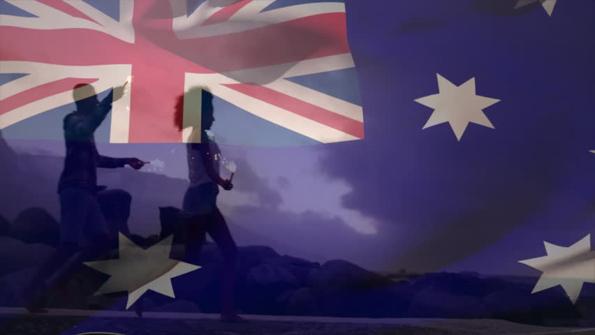 Celebrating with sparklers, silhouetted people overlaid with Australian flag animation. Celebration, fireworks, national, patriotism, night, joy