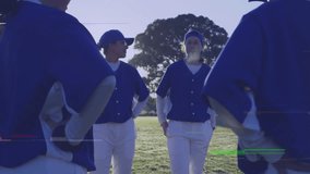 Wearing blue uniforms, baseball team standing together on grassy field. Sports, unity, athletes, competition - Powered by Shutterstock - Get 15% off with code: PIKWIZARD15