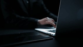 A modern business communication concept showcasing a hand reaching for a digital interface displaying contact options on a dark office background. Qubit - Powered by Shutterstock - Get 15% off with code: PIKWIZARD15