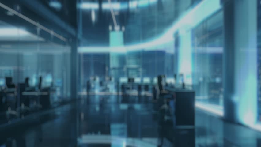A modern robotic hand engages with an interactive AI technology interface, surrounded by digital icons in a futuristic office setting, symbolizing innovation and automation. Auvana