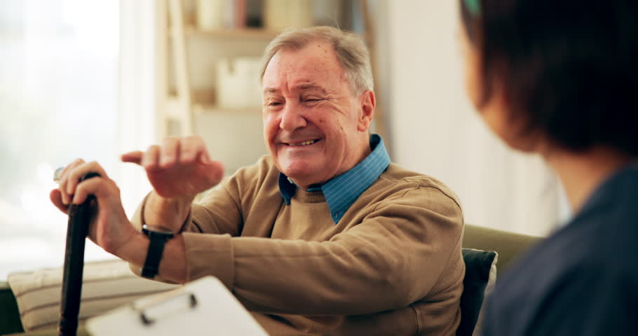 Senior man, nurse and shoulder pain in nursing home, support and healthcare for retirement. Patient, caregiver and person with a disability with cane, rehabilitation and medical elderly care