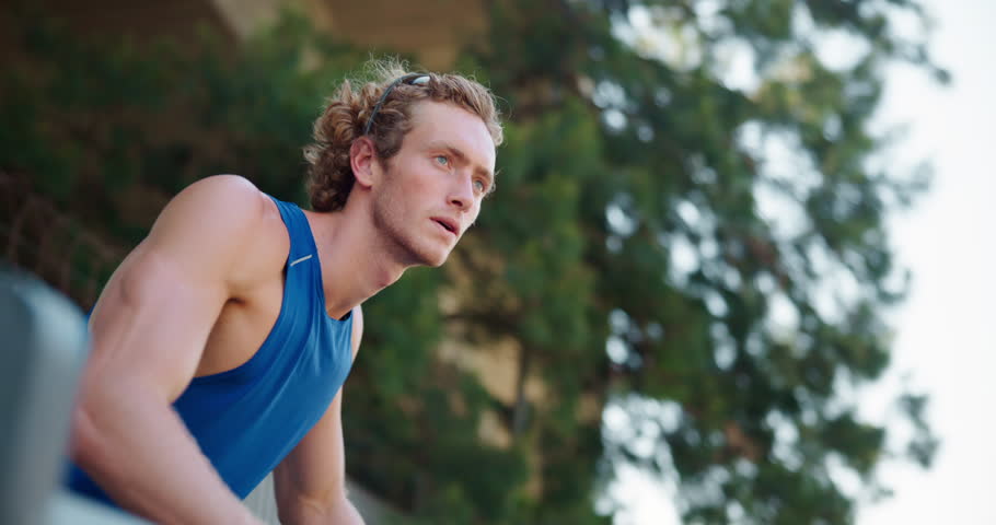 Fitness, thinking and man in city for push up, workout and exercise for active health or strong core. Incline movement, balance or athlete on bar for outdoor training, wellness ideas or muscle growth