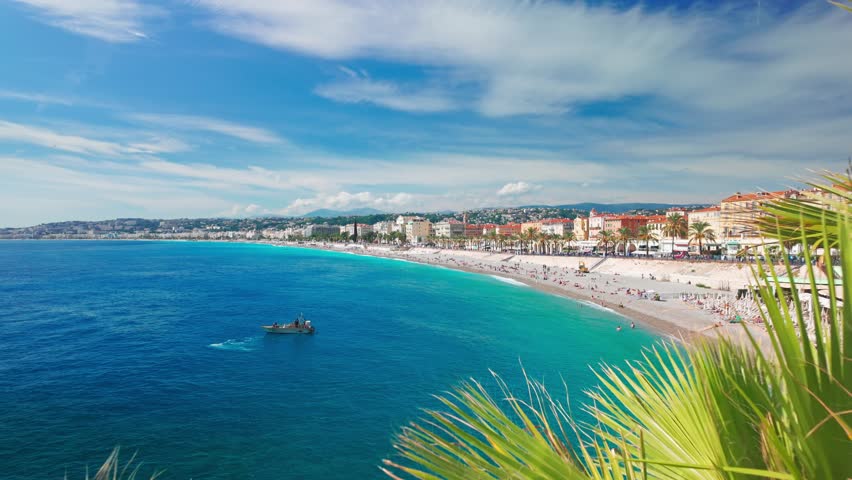 Beautiful view of Nice, Cote d'Azur, France. Cityscape of Nice on a sunny summer day on luxurious French Riviera. Top view revealing footage of the iconic Baie des Anges and the Mediterranean Sea