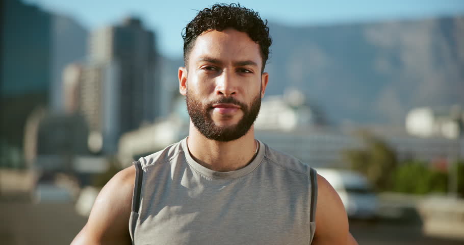 Fitness, happy and face of man in city for exercise, marathon training and workout outdoors. Sports, portrait and person rest for wellness, recovery and challenge in morning for health in Brazil