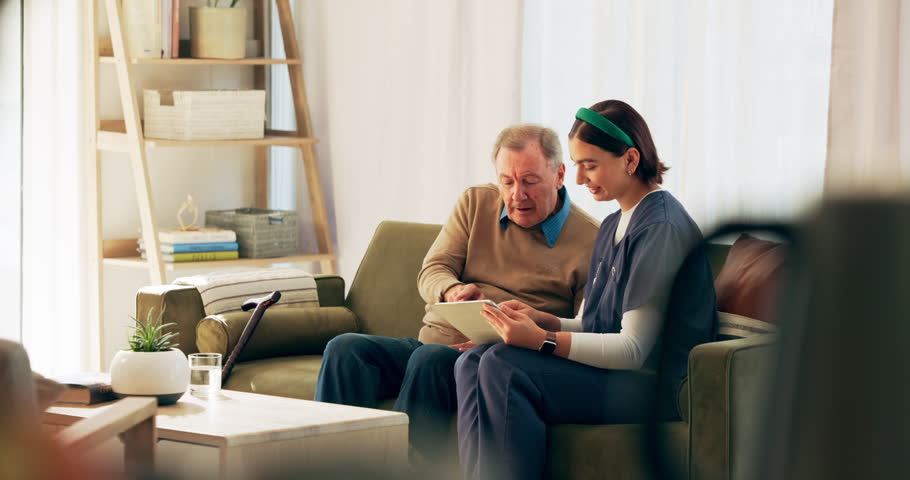 Senior man, nurse and tablet with checklist, support and healthcare for retirement. Patient, caregiver and therapist with technology for nursing home, rehabilitation and medical elderly care and help