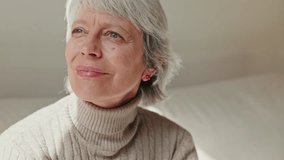 Portrait of a cheerful senior woman with grey hair, smiling and looking at the camera. She represents happiness, health, and aging gracefully. - Powered by Shutterstock - Get 15% off with code: PIKWIZARD15