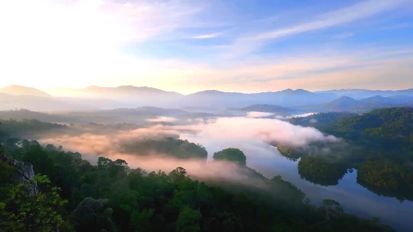 A time-lapse video of the sky captures the dynamic movement of clouds, the changing colors of the sky, and the passage of time, all compressed into a fast-paced sequence. 