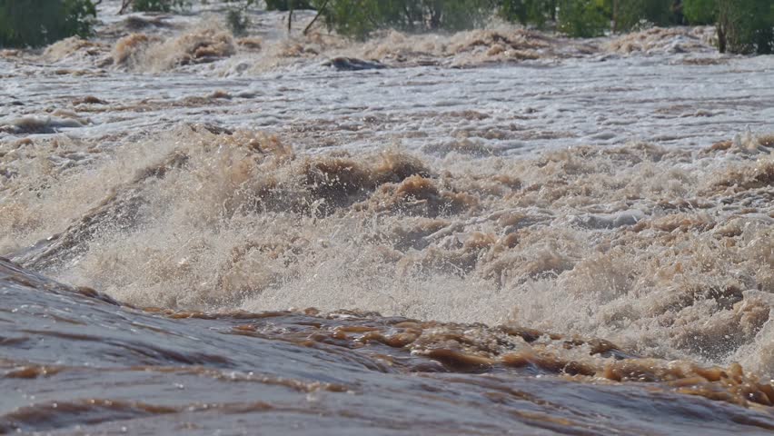 Cloncurry River in flood flooded, outback Australia Western Queensland, climate weather rain rainfall