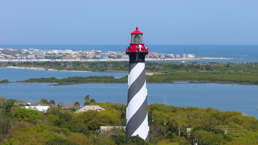 Tall lighthouse building on Anastasia Island in St. Augustine, Florida. USA travel destination landmark.
