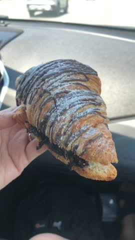 A very crusty flaky and yummy sweet chocolate croissant 