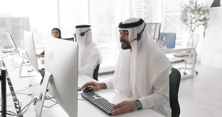 Group of sales representatives in Arabic wear lead remote talk, conducting product presentations or negotiating with clients via videocalls or webchats in coworking. Customer support services workflow