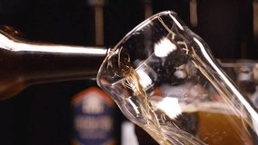 Light beer is pouring into glass. Cold Light Beer in a glass with water drops. Craft Beer forming foam close up. Freshness and froth. Microbrewery craft beer.	 - Powered by Shutterstock - Get 15% off with code: PIKWIZARD15