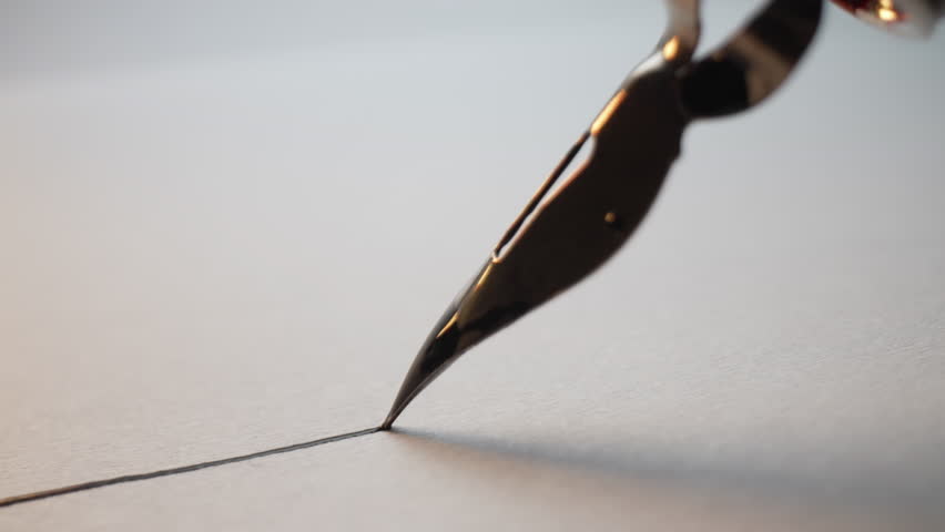 Macro of Fountain Pen Nib Writing Straight Ink Line On Textured Paper Surface 