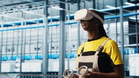 Engineer wearing VR headset in smart factory looking at collected data to do optimizations. Technicians using virtual reality in industry 4.0 industrial plant equipped with sensors, camera A - Powered by Shutterstock - Get 15% off with code: PIKWIZARD15