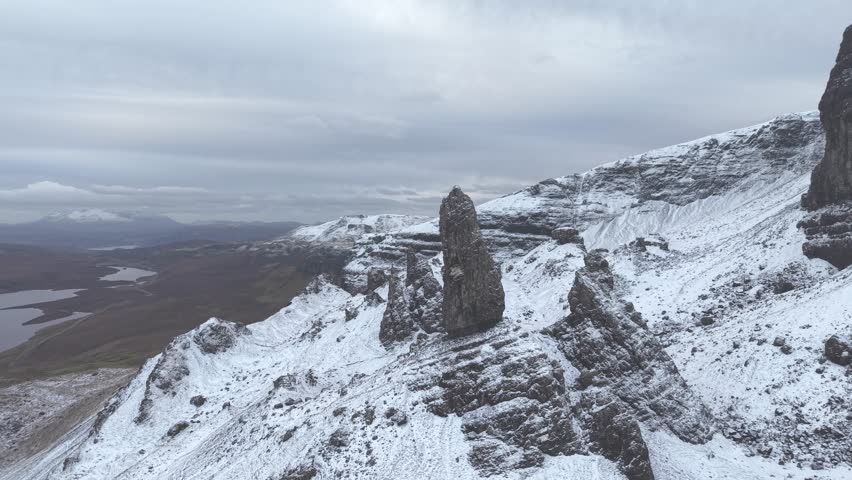 Old Man of Storr, features a steep rocky face in the Isle of Skye, Scotland, United Kingdom