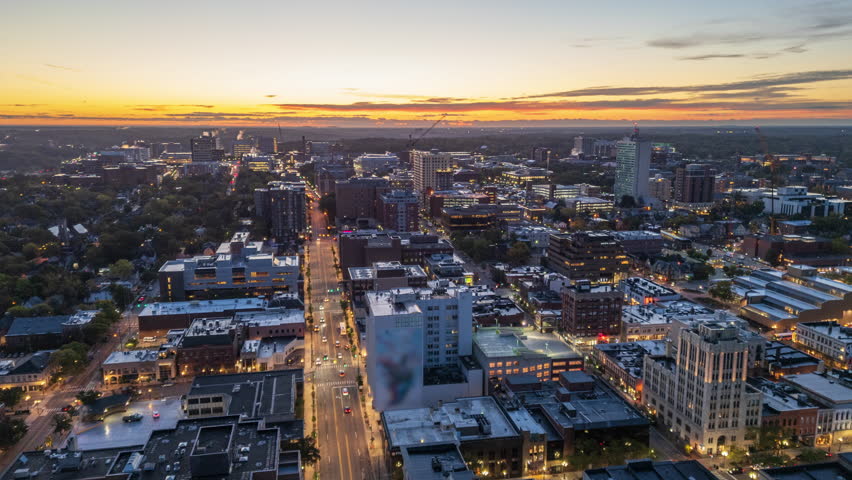 Ann Arbor, Michigan, USA college town skyline at dusk.