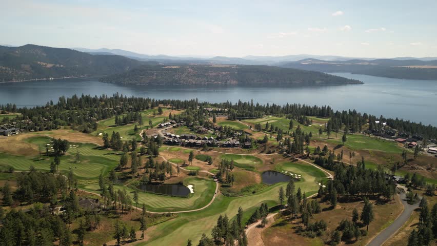 Aerial of golf course and country club around Coeur Dalene Lake in north Idaho in summer
