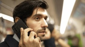Closeup image of skilled business man face phone call to project manager in train with blurred background. Attractive caucasian investor talking to investor while standing at subway. Exultant. - Powered by Shutterstock - Get 15% off with code: PIKWIZARD15