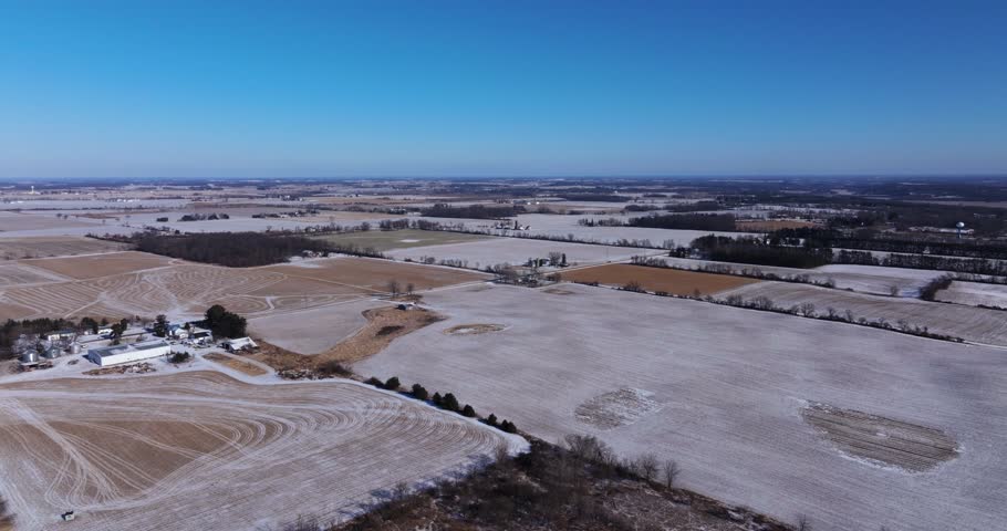 Beautiful Aerial View of Snowy Landscape in Rural Midwest America. Winter
