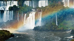 Iguazu waterfall with rainbow as seen from Brazilian side. - Powered by Shutterstock - Get 15% off with code: PIKWIZARD15
