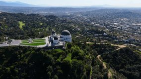 Cinematic Aerial Circle Around Griffith Observatory in Lush Green Hills of Los Angeles - Powered by Shutterstock - Get 15% off with code: PIKWIZARD15