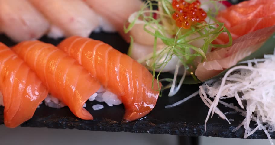 Savoring fresh sushi with vibrant flavors and delicate presentation in a tranquil setting