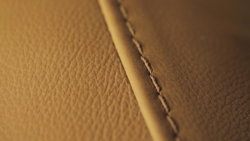 Brown leather texture close up, concept of texture and background.