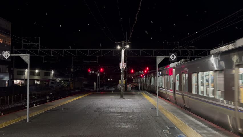 The Kyoto Station platform in the snow.