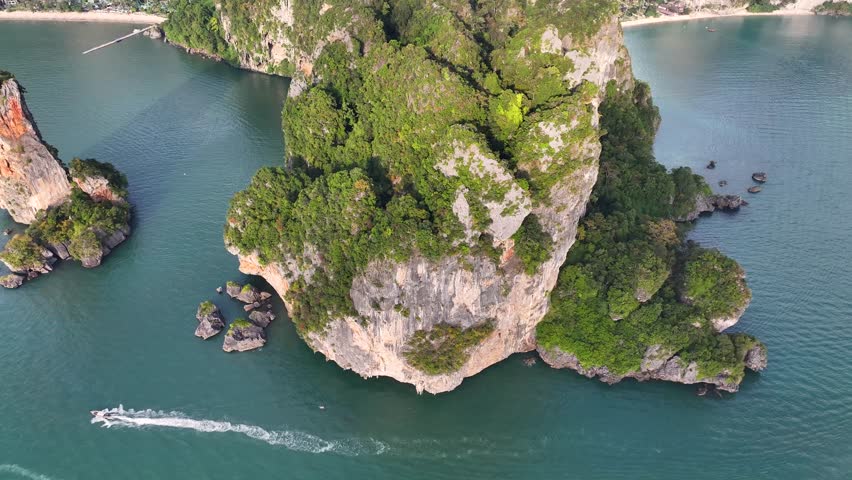 Rocky mountains on the Krabi shore with tropical climate. Aerial Ao Nang, Thailand