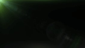 Abstract glow green optical flare shine Light rays moving from top left to top right animation on black abstract  background.  - Powered by Shutterstock - Get 15% off with code: PIKWIZARD15