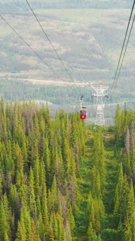 Jasper Sky Tram ascending the mountain, offering stunning views of the Canadian Rockies