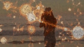 Silhouette of person taking photo over abstract glowing network animation. Technology, digital, photography, connection, futuristic, innovation - Powered by Shutterstock - Get 15% off with code: PIKWIZARD15